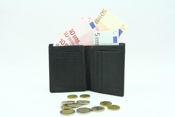 Banknoty EURO o różnym nominale w czarnym portfelu na jasnym tle - obrazy, fototapety, plakaty
