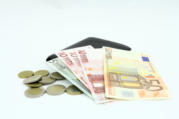 Banknoty EURO o różnym nominale w czarnym portfelu na jasnym tle - obrazy, fototapety, plakaty