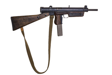 vintage submachine gun with canvas belt isolated