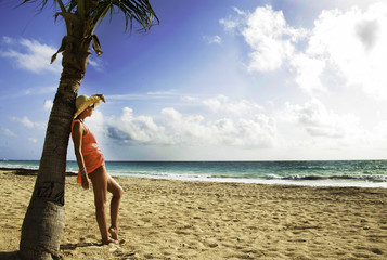 girl walking on sand beach by the Ocean Dominican republic Vacation travel concept