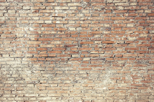 Old brick wall with white paint background texture