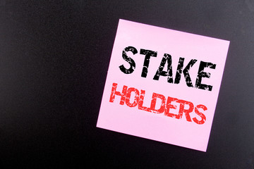 Word, writing Stake Holders. Business concept for Stakeholder Engagement written on sticky note, black background with copy space