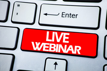 Handwriting Announcement text showing Live Webinar. Business concept for Business Web E-learning written on red key on the keybord background.