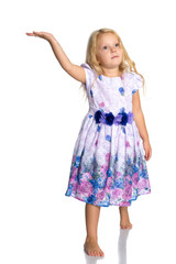 Fototapeta premium Little girl is showing a finger