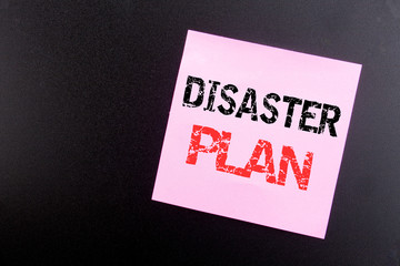 Word, writing Disaster Plan. Business concept for Emergency Recovery written on sticky note, black background with copy space
