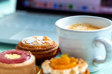 Handcrafted gourmet fruit tarts and pastries with coffee