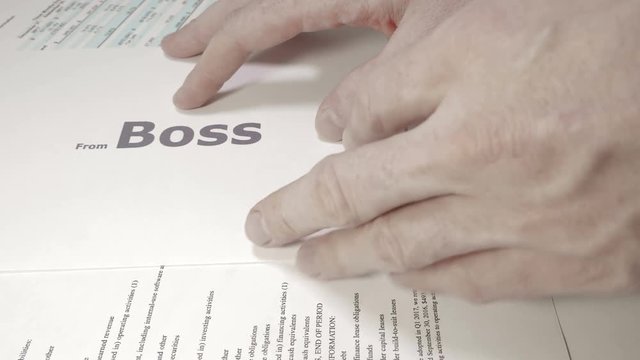 The man received a message from the HR department. The concept of job cuts and unemployment. The worker was upset and wilted