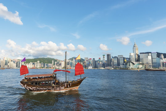 Junk Ship in Victoria Harbor of Hong Kong city