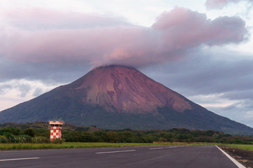 beautiful view of the volcano on Ometepe island, pink sunset
