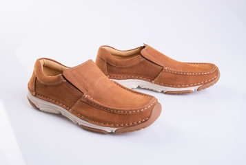 shoe or brown color men's shoes on a background.