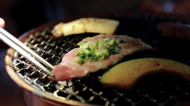 barbeque pork mush room and vegetable on steel net with hot coal with smoke01