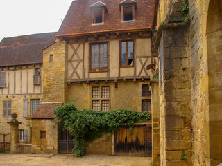 Fototapeta na wymiar Houses, streets and alleys in the picturesque medieval town Sarlat-la-Canéda in France