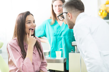 Obraz premium Patient and dentist team