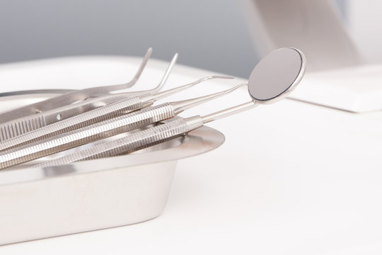 Set of stomatology tools used by dentists in dental office