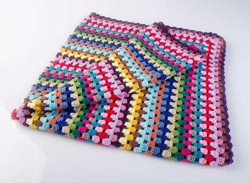 crochet or crochet blanket on a background.