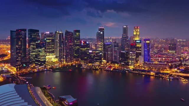 sunset sky singapore city famous flyer ride marina bay downtown panorama 4k timelapse
