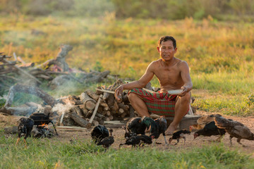Picture of rural old man in home at countryside.Living in rural Asia
