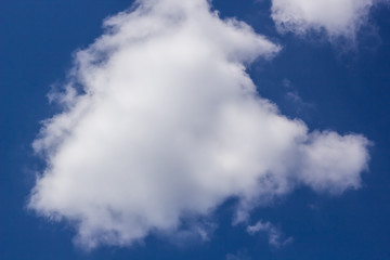 Fototapeta na wymiar beautiful blue sky background with a white clouds