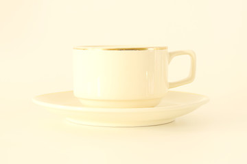 A cup of coffee is placed on a white background.