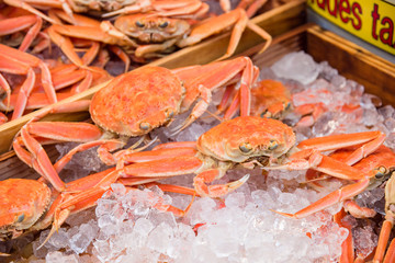 Fresh crabs on ice at kuromon ichiba market in Osaka,Japan