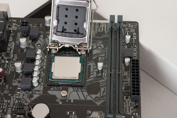 Fototapeta premium Close up of installed CPU processor on modern, new, motherboard