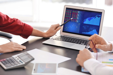 Young men working in office. Consulting service concept