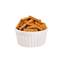 Brown sliced rye bread sticks as croutons in white ceramics bowl isolated on white background. Fast food template for menu, advertising, cover.