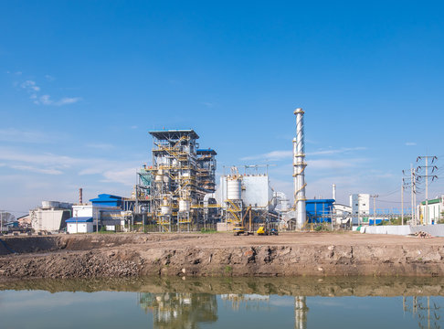 Biomass Power Plant And Blue Sky.