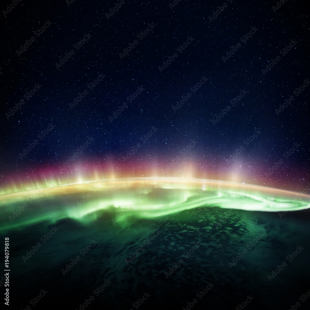 Sticker view of the planet earth and northern lights from space. elements of this image furnished by nasa.