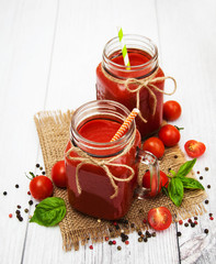 Jars with tomato juice
