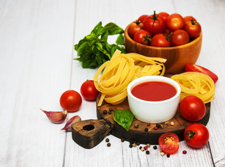 Bowl with tomato sauce