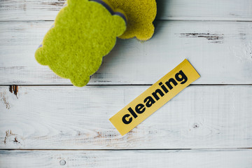 Cleanup in a kitchen. A bright abstract composition with scrub dishwashing sponges on a white...