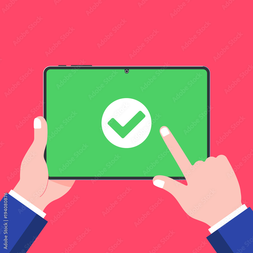 Poster hand holding black tablet device isolated on green background. pad tablet on human's hands with chec