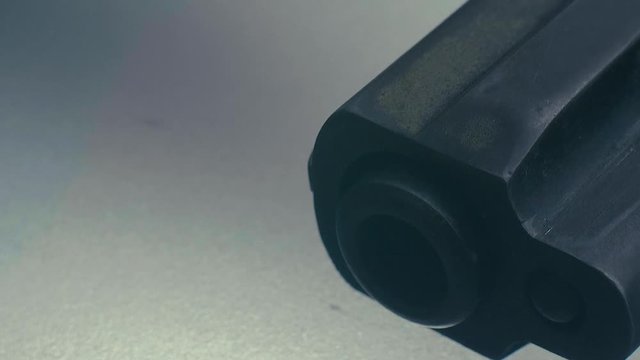 CSI expert table - gun close up, close up automatic pistol handgun weapon on white background