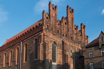 View of the St. Nicholas Church in Gdansk, Poland. Is the Gothic Dominican church dating from 14th century, one of the few in Gdansk not destroyed in Second World War. 