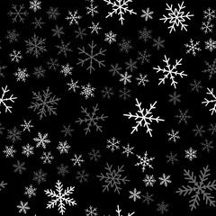 White snowflakes seamless pattern on black Christmas background. Chaotic scattered white snowflakes. Shapely Christmas creative pattern. Vector illustration.