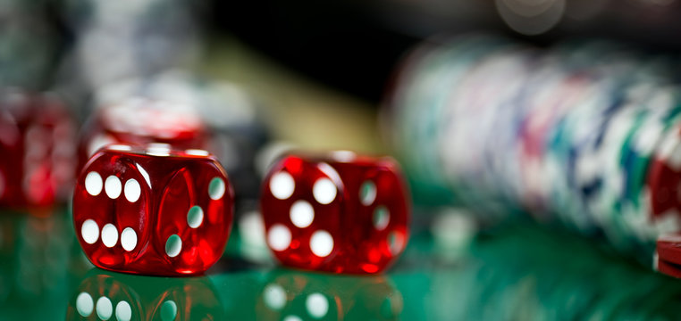 High contrast image of casino roulette and poker chips