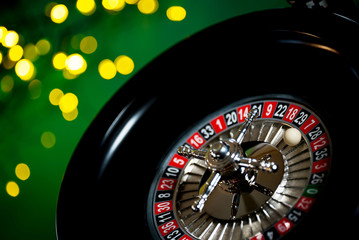 High contrast image of casino roulette and poker chips