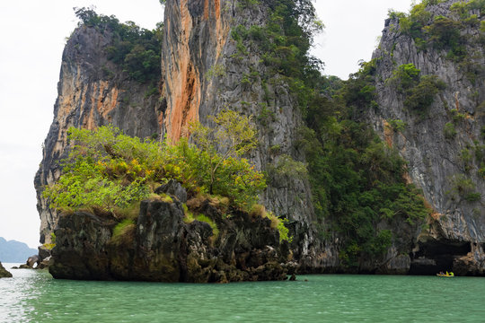Thailand, Phuket, 2017 - kayaking under sea rocks