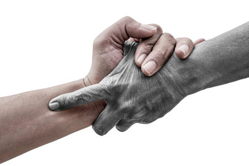 Dramatic help hands holding together representing friendship, partnership, help and hope, donation,...