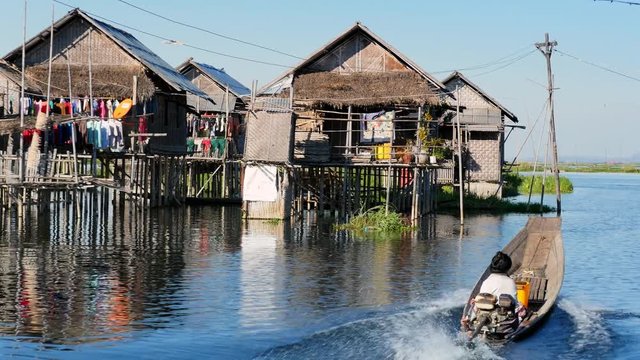 Inle Lake, Shan State, Myanmar (Burma), view of stilt houses at traditional floating village.