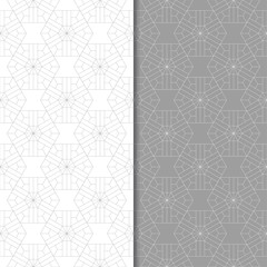 Gray and white geometric set of seamless patterns