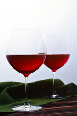 Two glasses of red wine. 