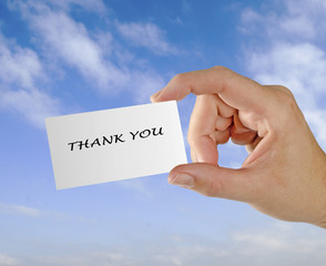 Hand with thank you note
