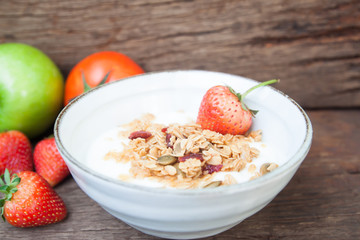 Greek yogurt with granola and strawberry in a bowl, Healthy food