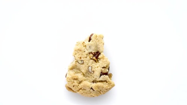 chocolate chip cookie on white background being eaten up time lapse animation
