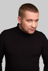 Obraz premium Serious man is wearing casual clothes.