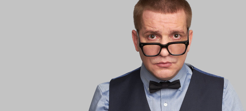 Handsome guy in glasses and bow tie