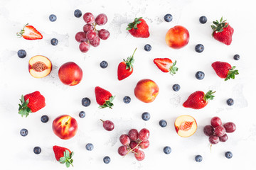 Fruit pattern. Fresh fruits Strawberry, blueberry, peach, banana, grape on white background. Flat...