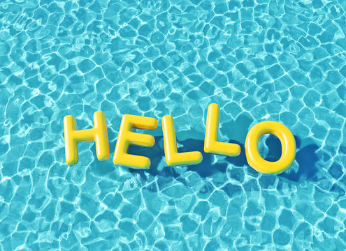 Clear blue swimming pool with hello word floating on the water